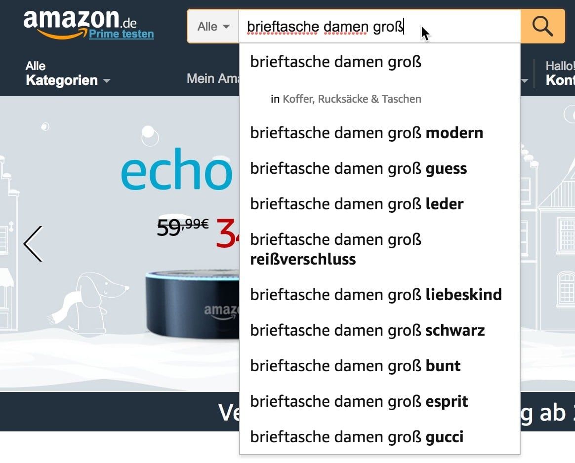 Abbildung der Amazon Suchleiste mit dem Keyword Brieftasche Damen Groß als Beispiel für die verfeinerte Keyword-Recherche mit Amazon Suggest