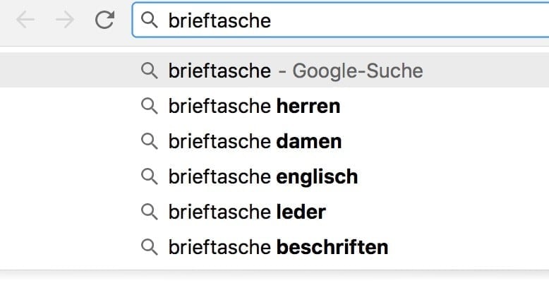 Abbildung der Google Suggest mit dem Beispiel Brieftasche für die Keyword-Recherche im Rahmen der Amazon SEO
